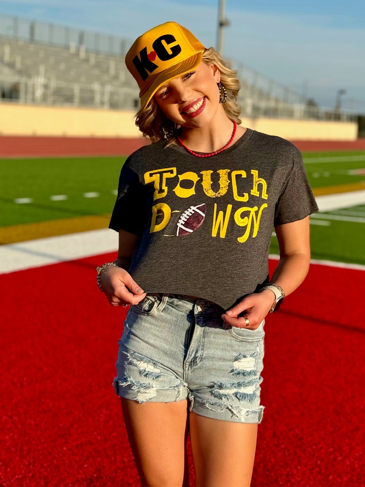 Gold Touchdown with Sequin Football by Randi Mahomes